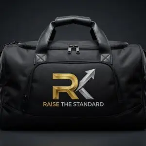 RK Elite Duffel Bag — black ballistic nylon gym travel bag with embroidered gold silver RK Raise The Standard logo