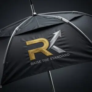RK Signature Umbrella — black windproof umbrella with embroidered gold silver RK Raise The Standard logo chrome frame ribs